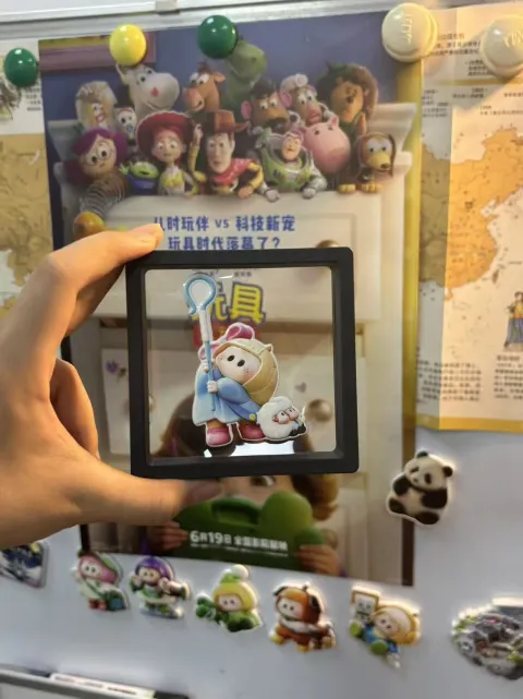 A Storybook Afternoon, a dimensional character fridge magnet displayed in a black frame